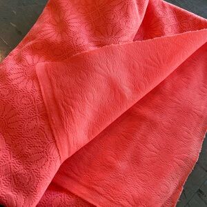 Coral daisy print fortrel fabric